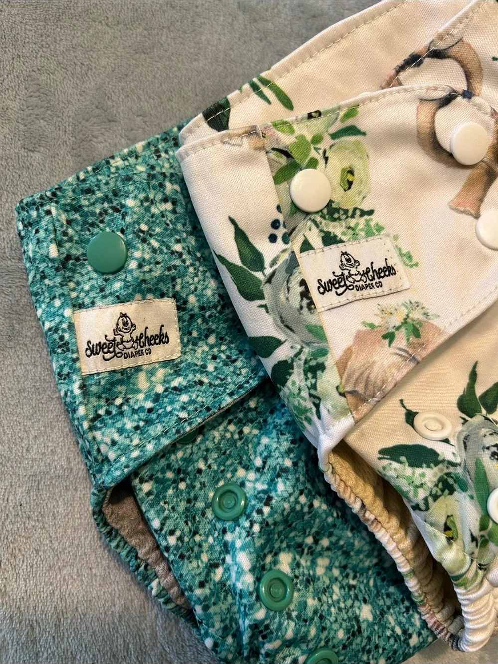 2 cloth diapers from sweet cheeks diaper co